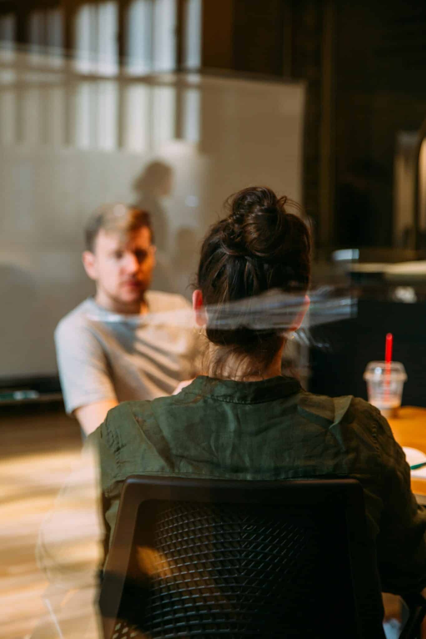 People having a professional meeting in office. ADHD Coaching UK