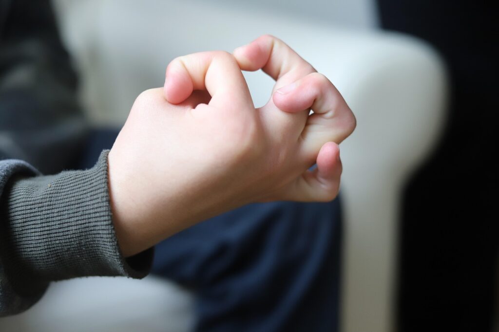 a close up of a hand - Hypermobility and ADHD