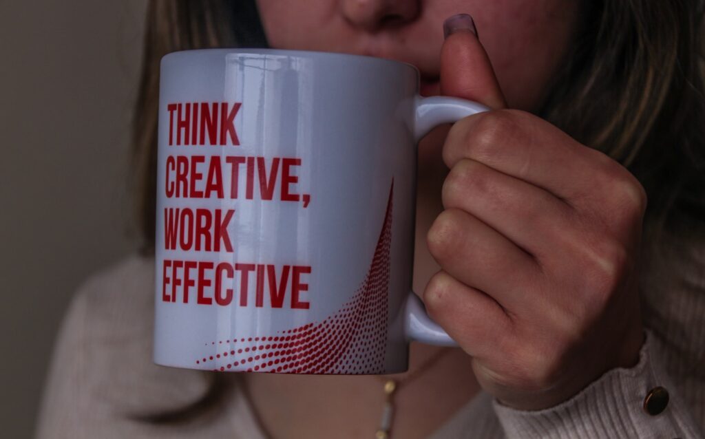 white and red ceramic mug adhd coach uk